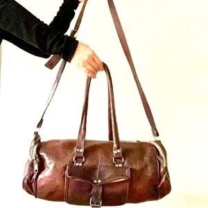 Genuine leather vintage duffel bag.